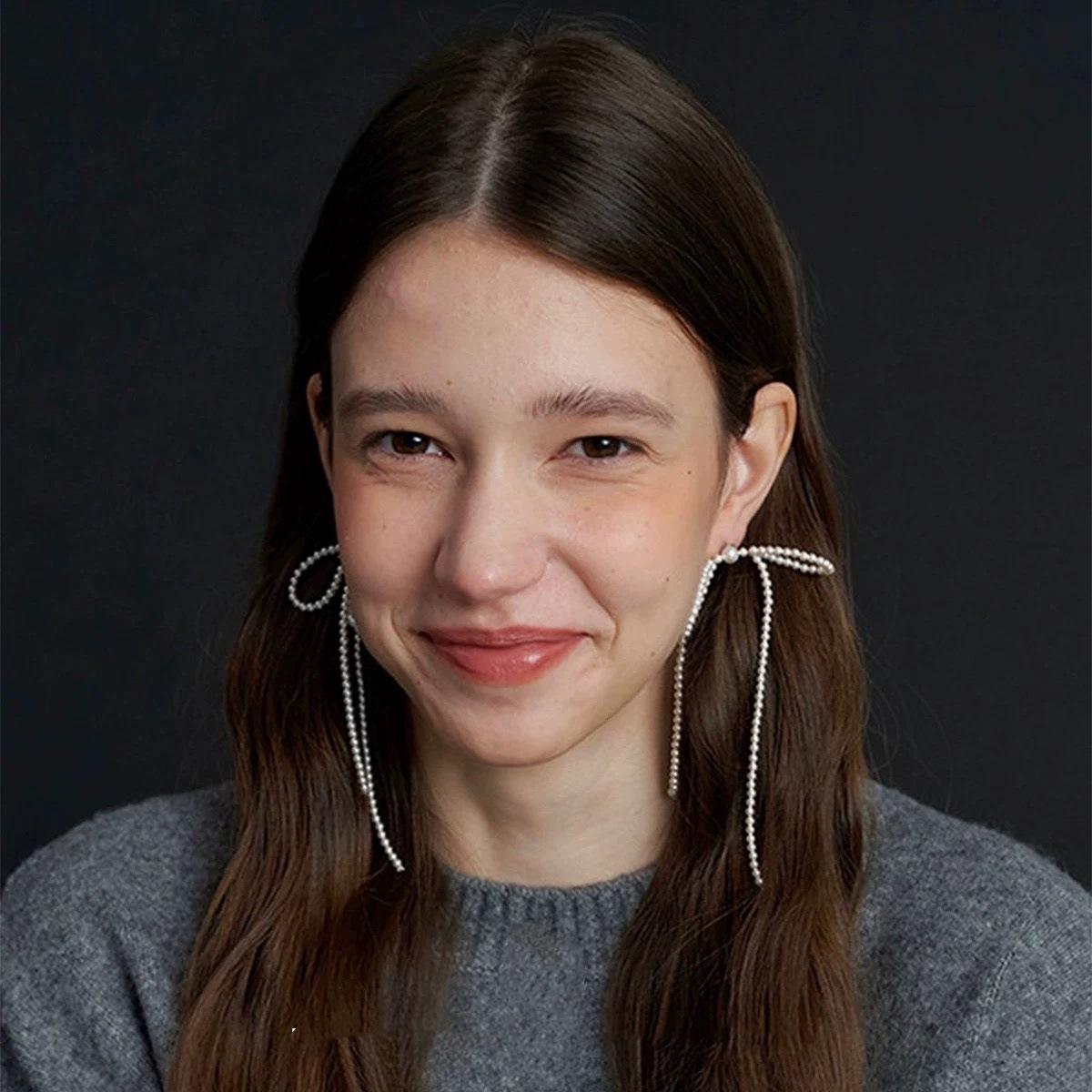 秋冬新手工编织款珍珠蝴蝶结耳钉女s925银针气质小众设计流苏耳环