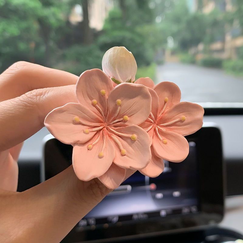 INS风可爱夏日桃花车内花朵空调车载扩香石装饰香水香薰