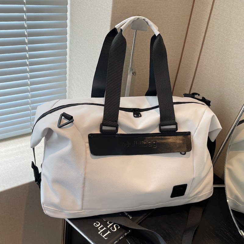 旅行包女大容量手提行李袋出游包衣物收纳大包男登机包短途待产包