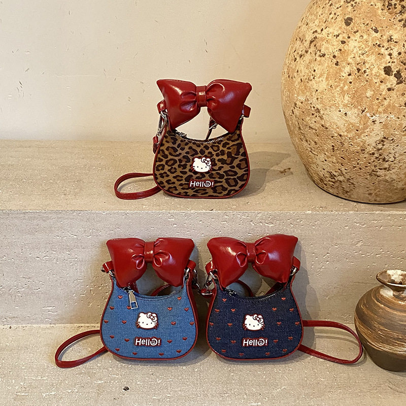 HelloKitty牛仔蝴蝶结蕾丝斜挎包甜酷迷你包可爱刺绣少女心手提包