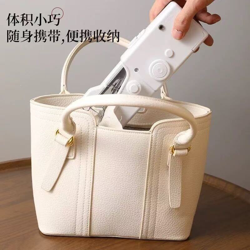 手持电动缝纫机自动缝补手工裁缝机器家用小型迷你便携包邮亚马逊