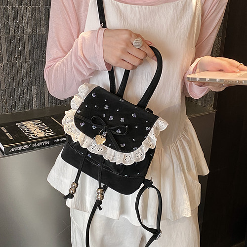 网红甜美蝴蝶结双肩包包女2026新款潮少女感通勤背包高级感小书包 - 封面