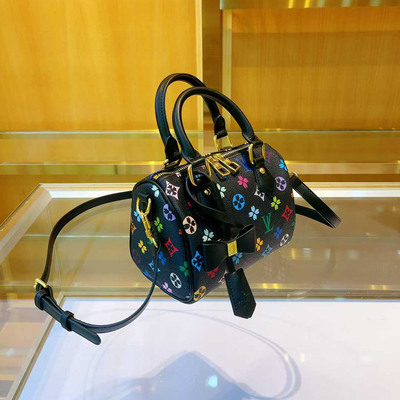 香港新款真皮黑三彩枕头包女