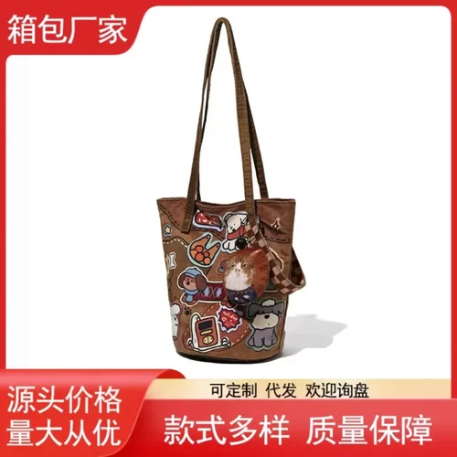 韩版原创可爱小狗印花通勤包休闲水桶包斜挎帆布包大通勤包女