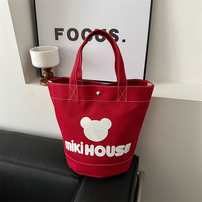 帆布手提包妈咪外出水桶包大容量