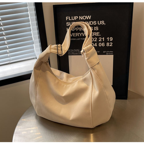 休闲纯色帆布包大容量饺子包斜挎