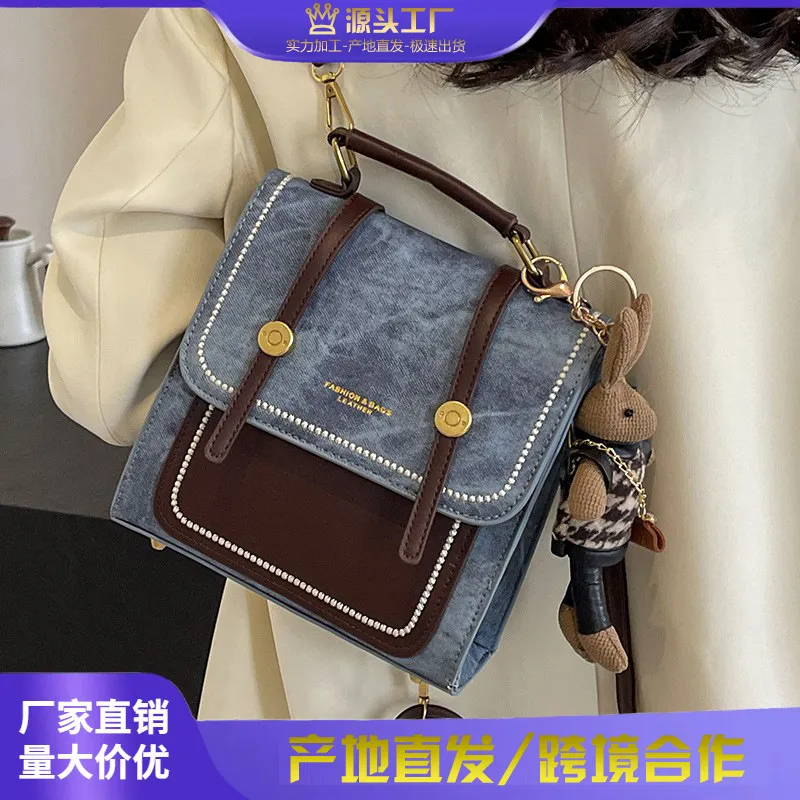 感小型牛仔一包三用双肩包女2025新款时尚斜挎短途旅行小背包