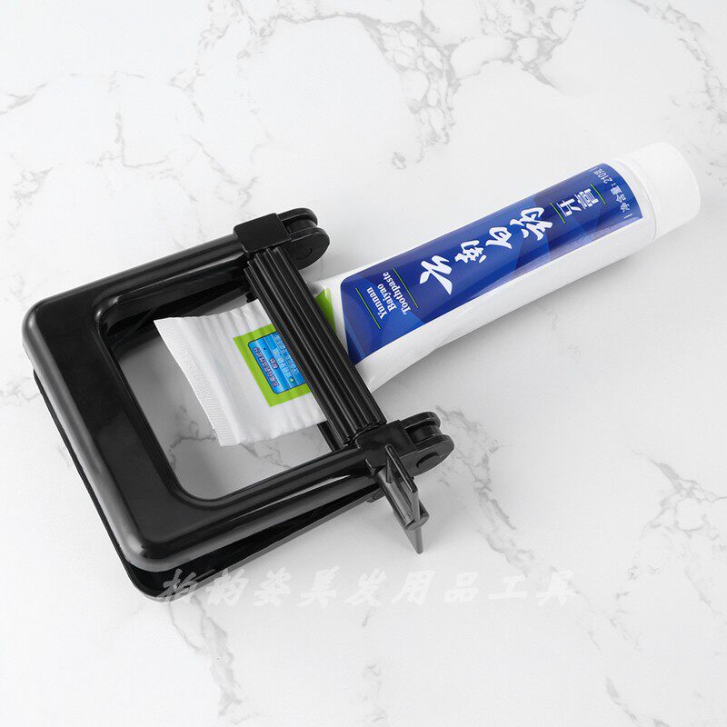 速发挤染膏器挤牙膏器挤压器手动塑料美发挤染膏夹包邮美发工具用
