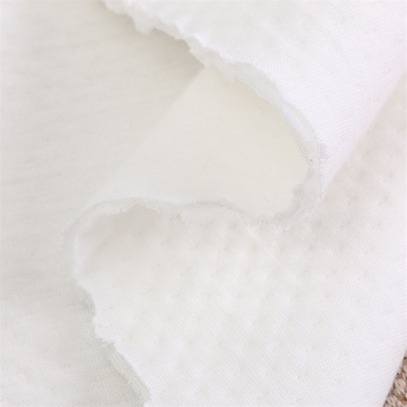 速发暖个点子素色提花空气层 针织棉夹两提花布 婴童爬服保棉面料