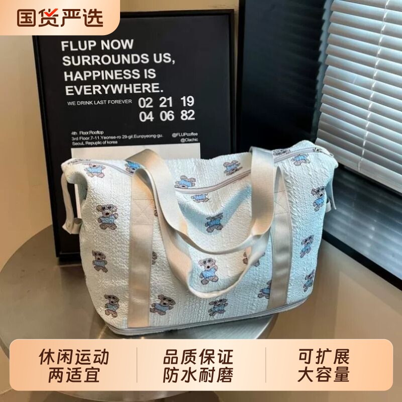 可爱手提短途旅行轻便包图片
