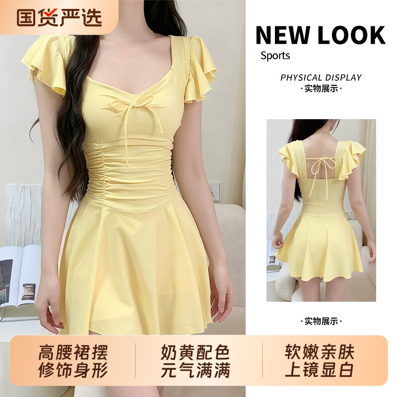 嫩黄连体泳衣女显瘦遮肚度假泳装图片