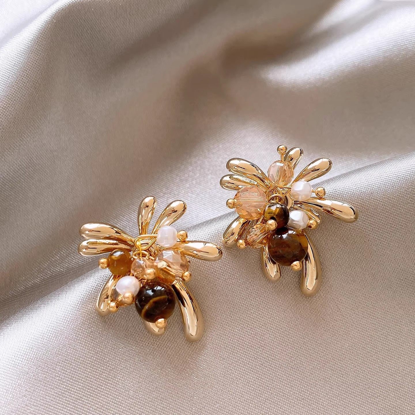 爆款轻奢秋冬款美拉德金色烟花耳环女时尚百搭气质虎眼石耳钉耳