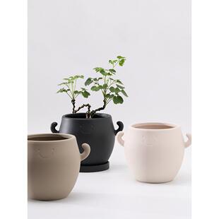 斯堪的纳维亚卡通微笑的男孩红色陶器花盆粘土粗陶吸水和透气托盘