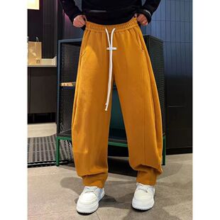 语乐服饰 2025冬季暖南瓜色弯刀加绒加厚抽绳设计休闲长裤