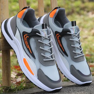 新品夏季网面透气男鞋子男t士运动鞋休闲防滑老爹鞋男网鞋防臭青