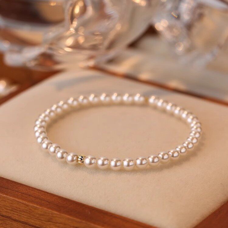 正圆奶油珍珠手链串珠个性时尚轻奢小众气质法式高级感手串弹力绳