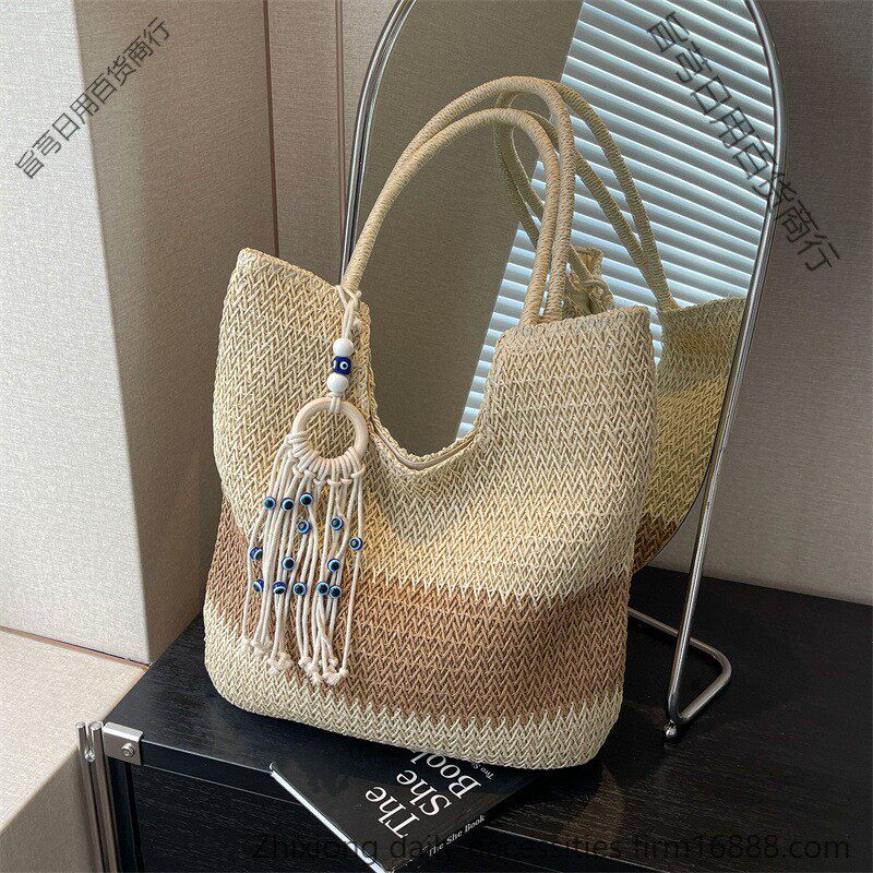 夏季大容量托特包女士新款法式沙滩度假编包时尚流苏通勤包