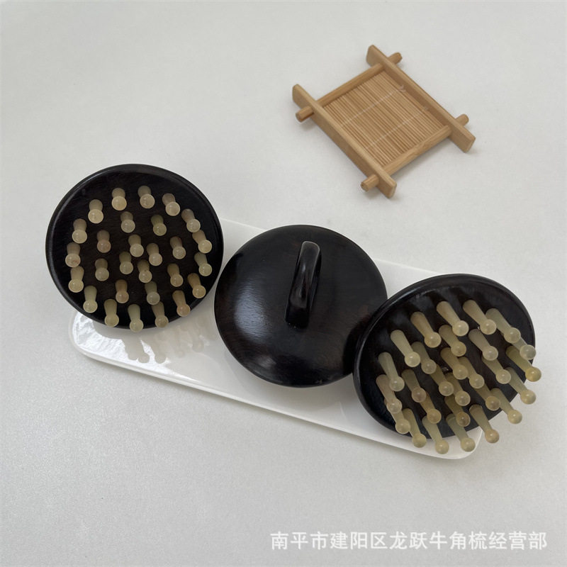 厂家批发牛角梳牛角28钉黑檀环指梳头部经络按摩梳手柄梳刮痧板