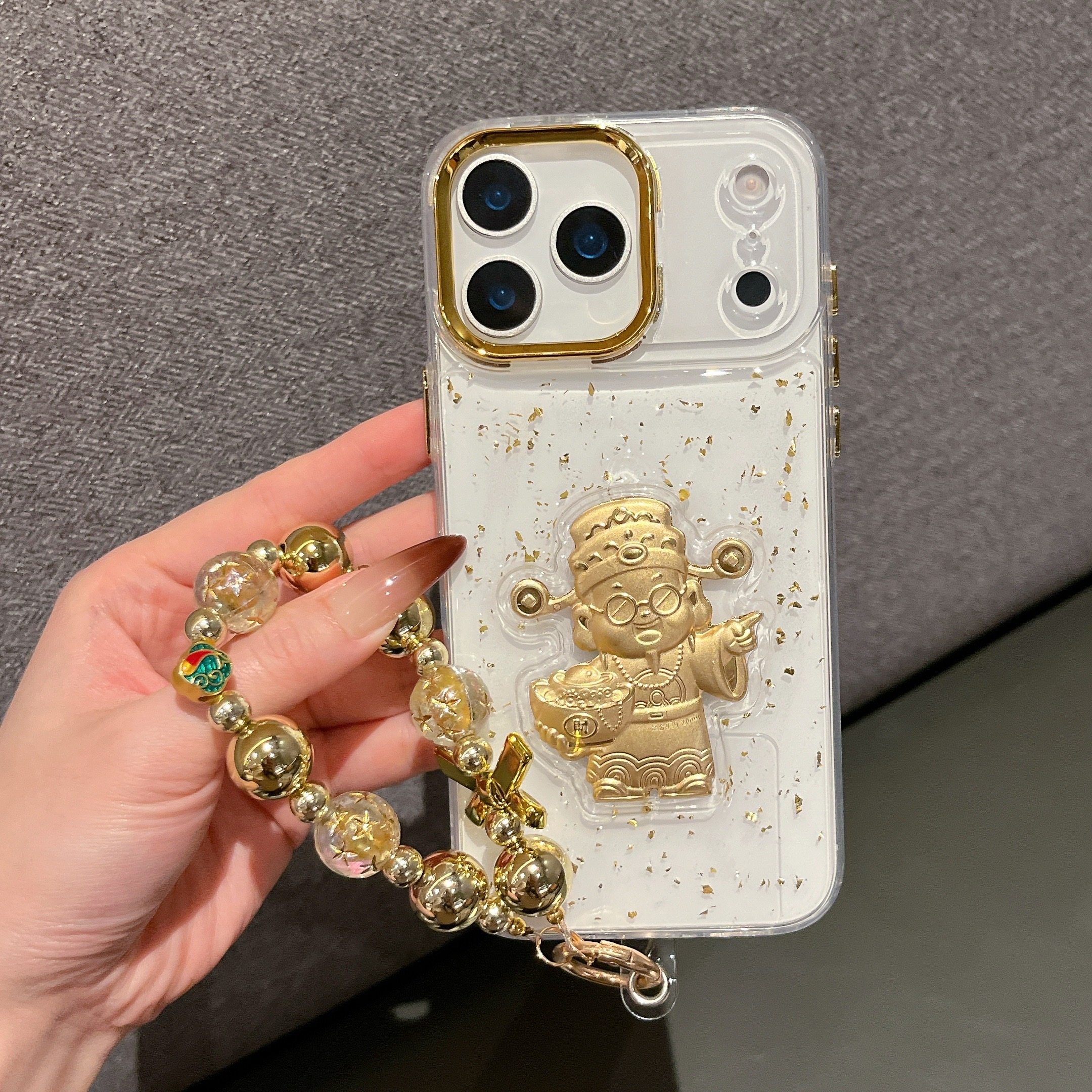 金边滴胶黄金色财神爷适用iPhone17promax手机壳15苹果16招财14带手链13手串防摔透明全包12新年款暴富保