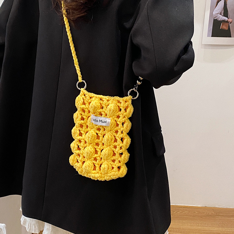 2025新款手工编织手机包女高级感通勤斜挎包小众设计感镂空单肩包
