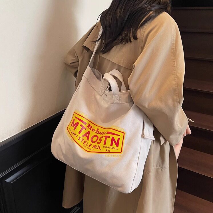大容量帆布包女2025新款百搭休闲斜挎包手提大学生上课通勤托特包