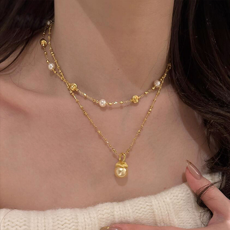 日本品质小松果猫眼珍珠项链配饰女轻奢小众锁骨链高级感叠戴吊坠