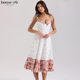 House CB精致浪漫白色花卉印花弹力棉中长太阳裙Emely