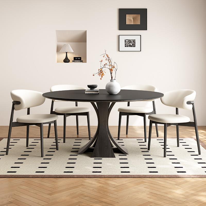 中古风圆形实木餐桌2025新款家用小户型岩板黑色法式复古现代简约