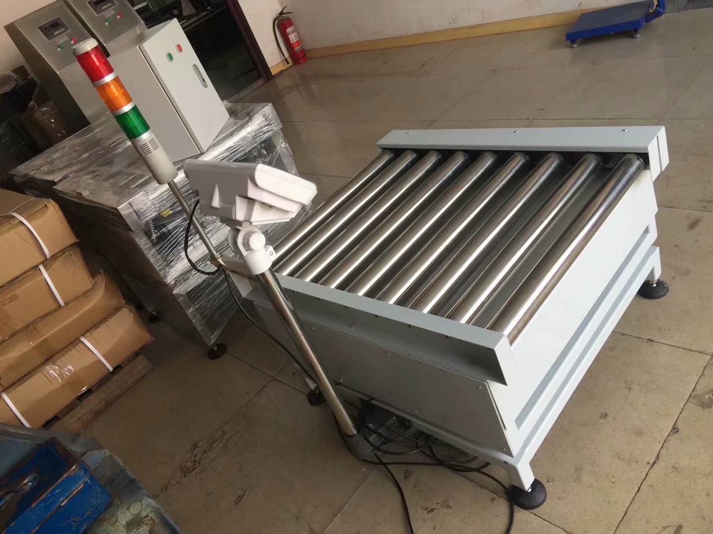 输送滚筒定量包装秤自动启停