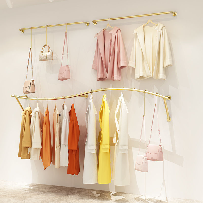 新简约服装店展示架上墙金色童装货架壁挂式女装店挂衣服架子