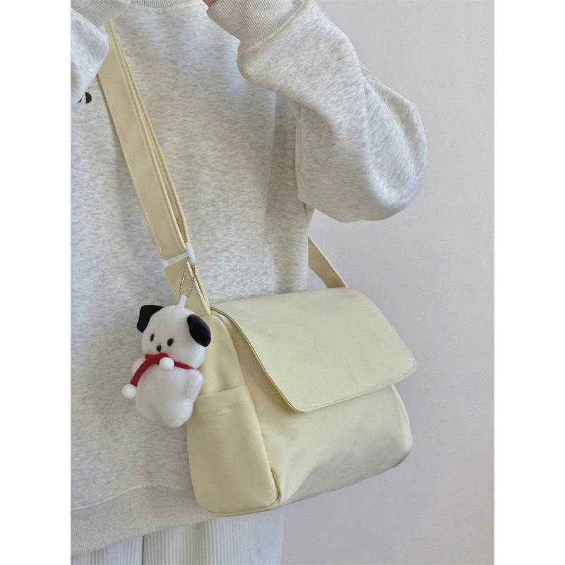 日系简约纯色文艺百搭学院风ins单肩斜挎包女尼龙小众韩版邮差包