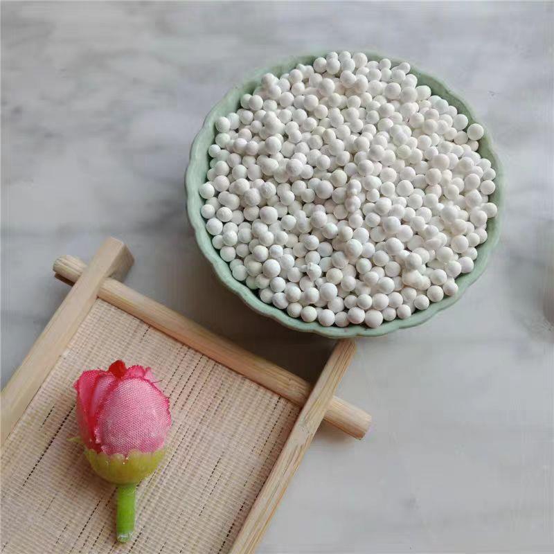 亚硫酸钙净水滤料除余氯亚硫酸钙颗粒除氯球亚硫酸钙球