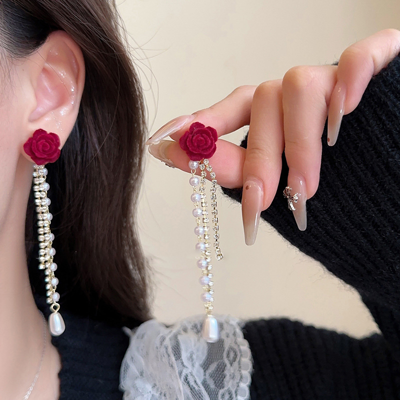 红色植绒蝴蝶结珍珠流苏耳