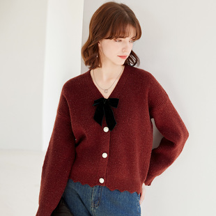 纳纹2025秋款V领蝴蝶结设计感上衣休闲气质单排扣毛衣女