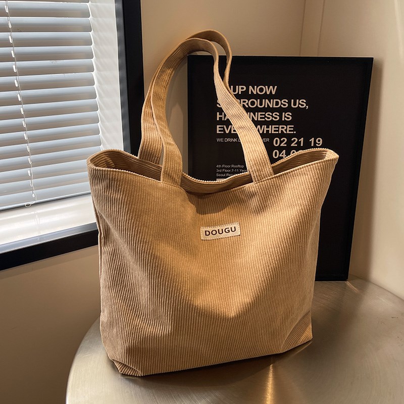 秋冬小众条绒托特包女2025新款潮大容量手提袋百搭学生补课通勤包