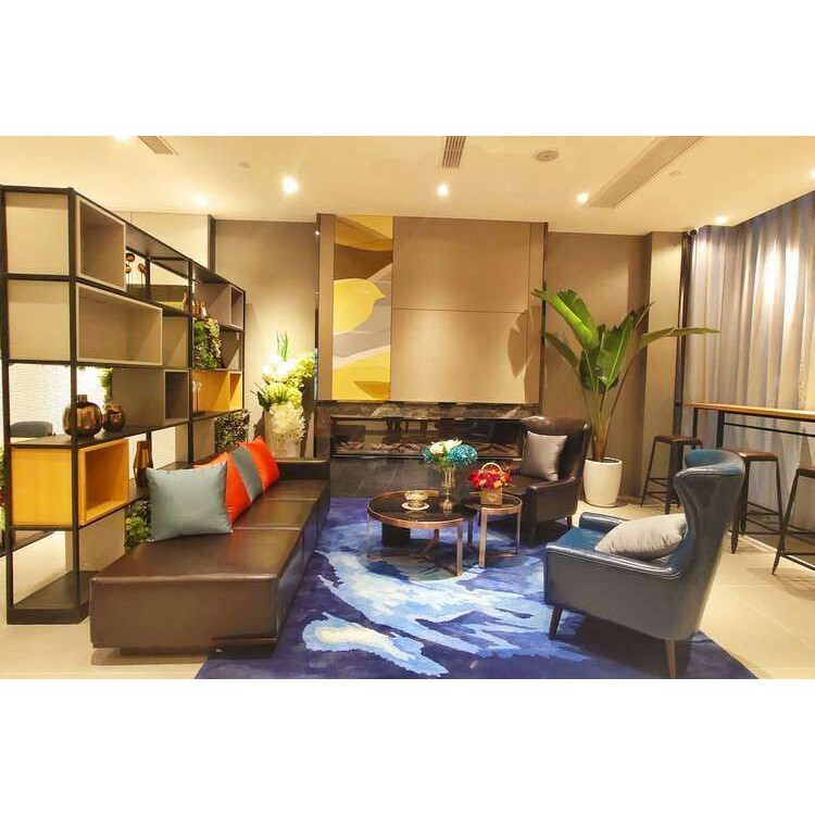 北欧轻奢皮质沙发椅简约如家酒店单人沙发沙发