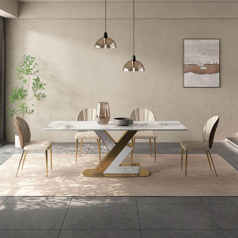 轻奢进口岩板餐桌家用简约钛金长方形小户型网红餐桌椅子组合