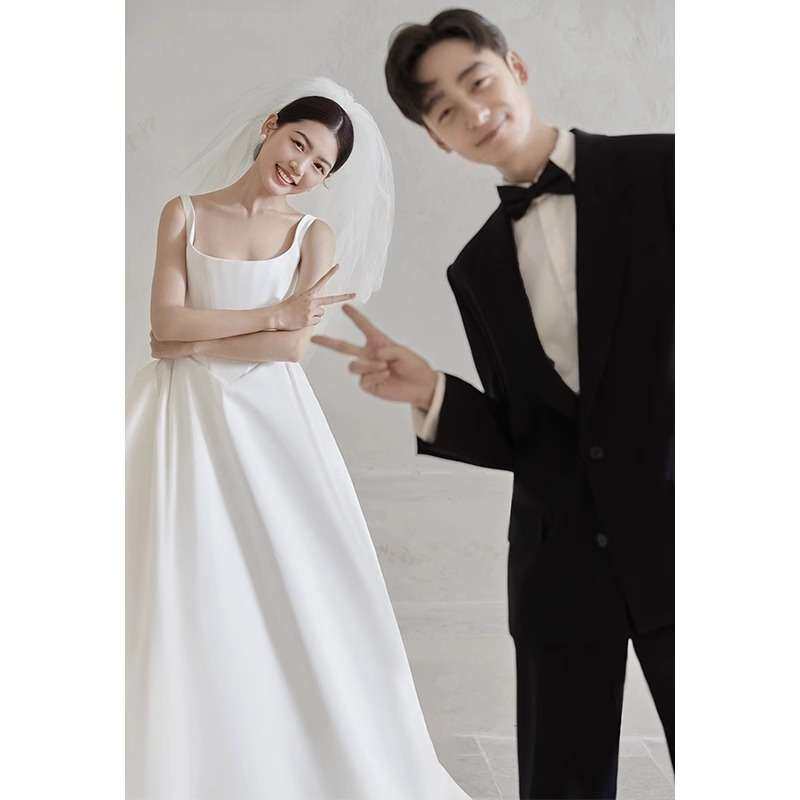 新娘吊带轻婚纱结婚主纱2026新款白色简约高端奢华缎面出门纱礼服