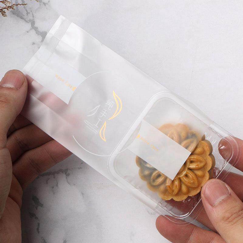 新款直销简约纯手工月饼包装袋50克75克100g机封袋带托盒蛋黄酥冰