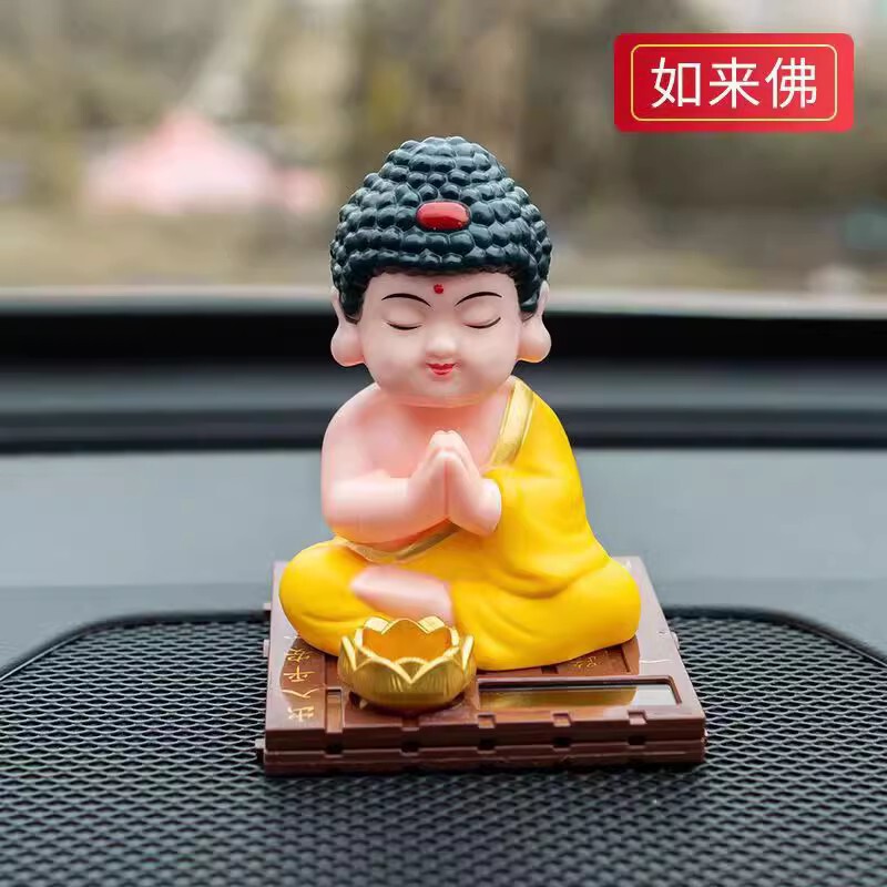 塑料太阳能如来佛像点头汽车摆件小和尚敲木鱼车载中控台装饰女