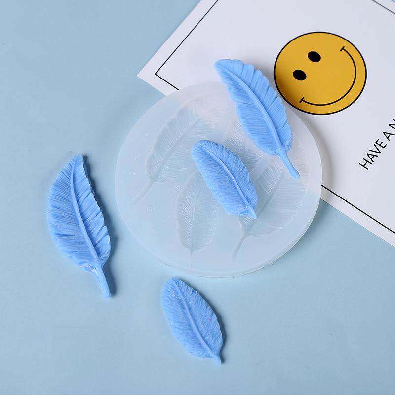 2020新款圣诞模具羽毛钻石松果香薰蜡烛硅胶模具烘焙巧克力模