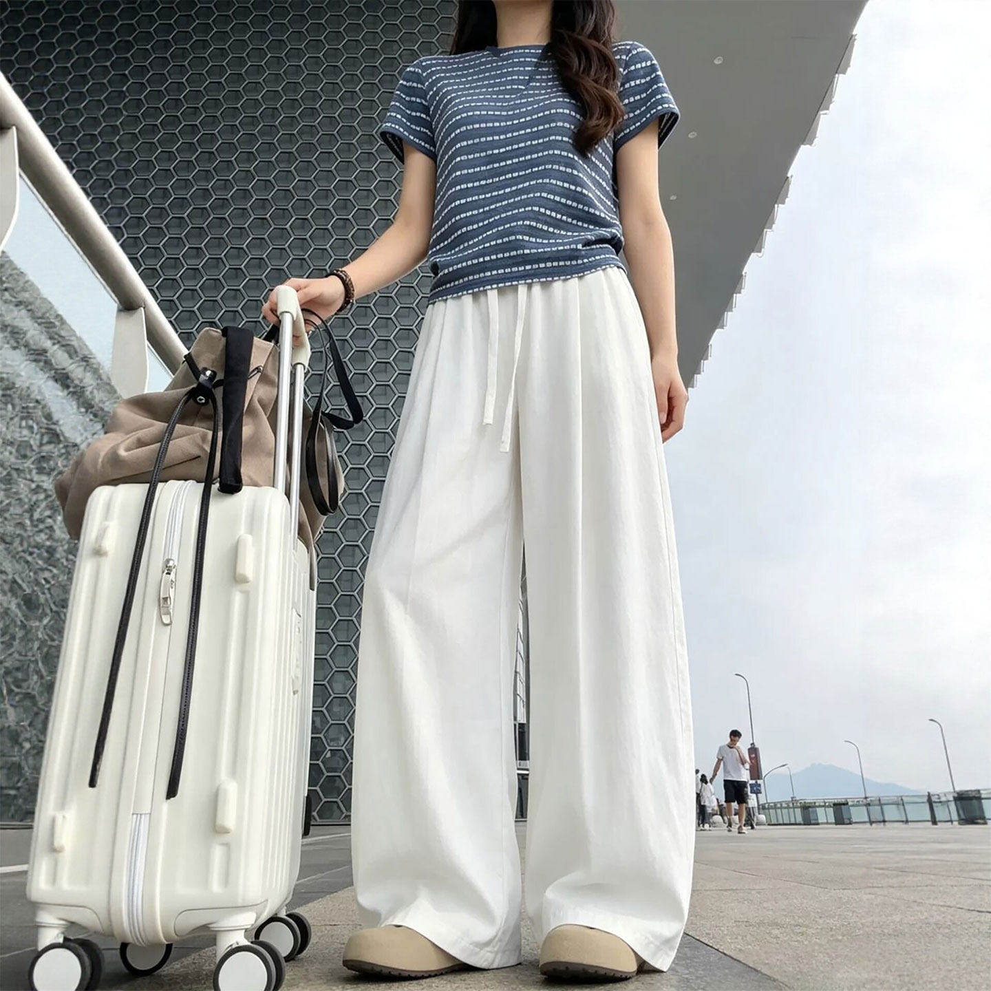 白色亚麻阔腿裤女夏季薄款2026新款高级感垂感老钱风棉麻弯刀裤子