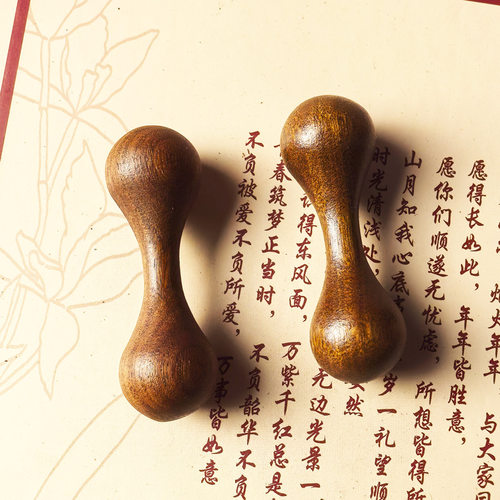 金丝檀木指尖陀螺手把件绿檀紫光