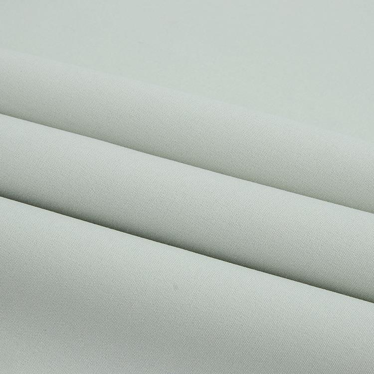 新款直销100D梭织四面弹布料 涤纶平纹四面弹面料 涤氨梭织弹力时