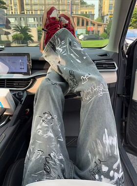 涂鸦泼墨蓝色牛仔裤男款秋冬潮牌痞帅炸街裤子美式高街弯刀微喇裤