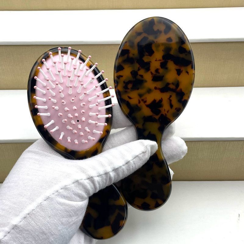 红花山龟壳养身文玩玳瑁色气垫梳子旅游保健梳新款设计师款长柄梳