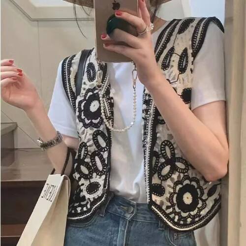 V-neck hollowed out sleeveless cardigan womanV领镂空无袖开衫