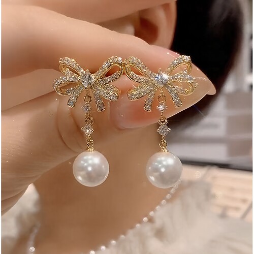 9999纯银微镶珍珠蝴蝶结耳环