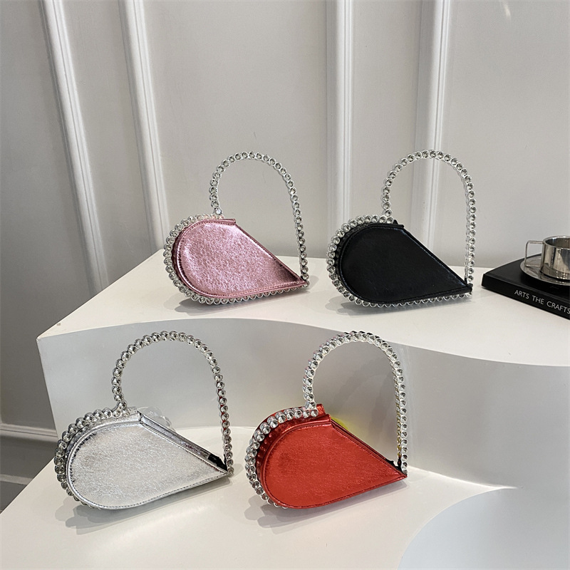 日本品质爆款女包2025新款手拿包优雅心形镶钻晚宴包时尚洋气手拎