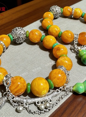 爆款新中式国风蜜蜡鸡油黄老蜡多宝手串原创设计高级感生日礼物